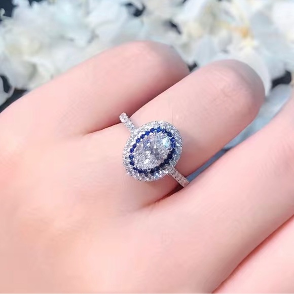 Beautiful CZ Stone Ring with Sapphire Blue Halo around Large Stone - Picture 2 of 4